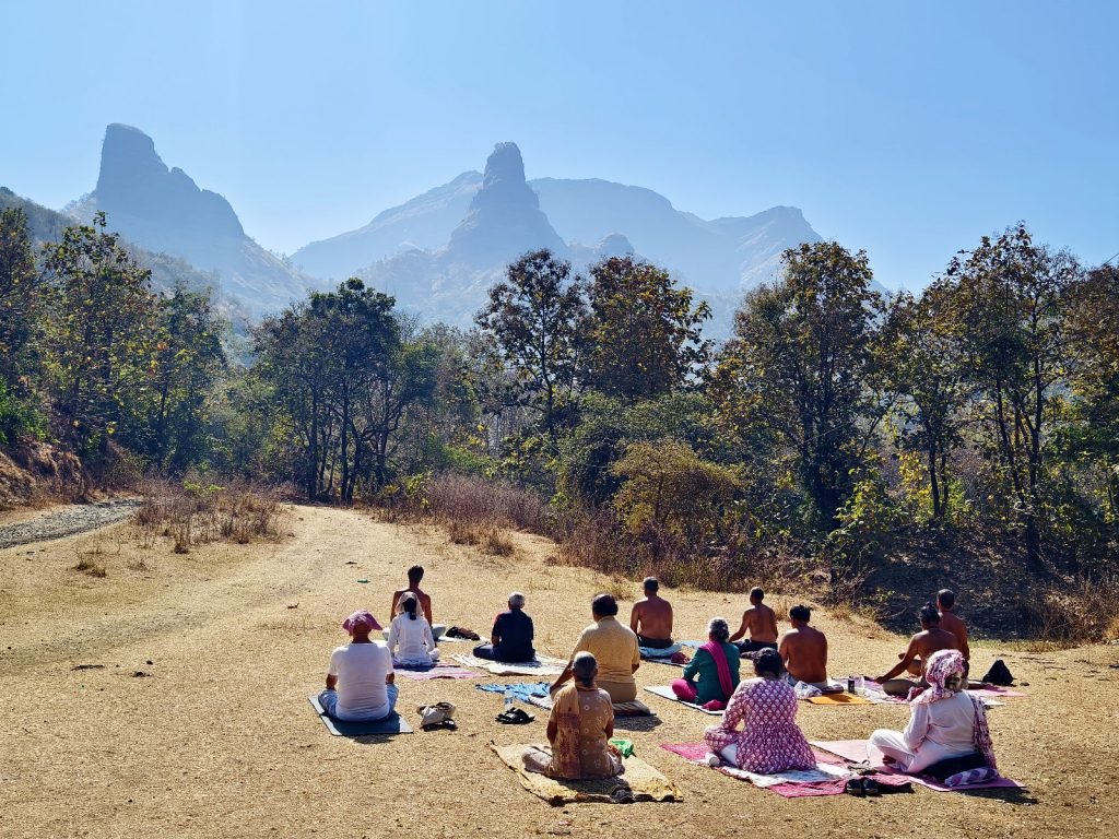 Sun meditation by mountains
